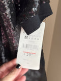 Conjunto de paillete negro de Zara TRF